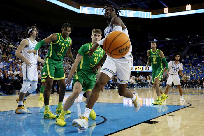 UCLA Bruins forward Kenneth Nwuba chases the loose ball against the Oregon Ducks.